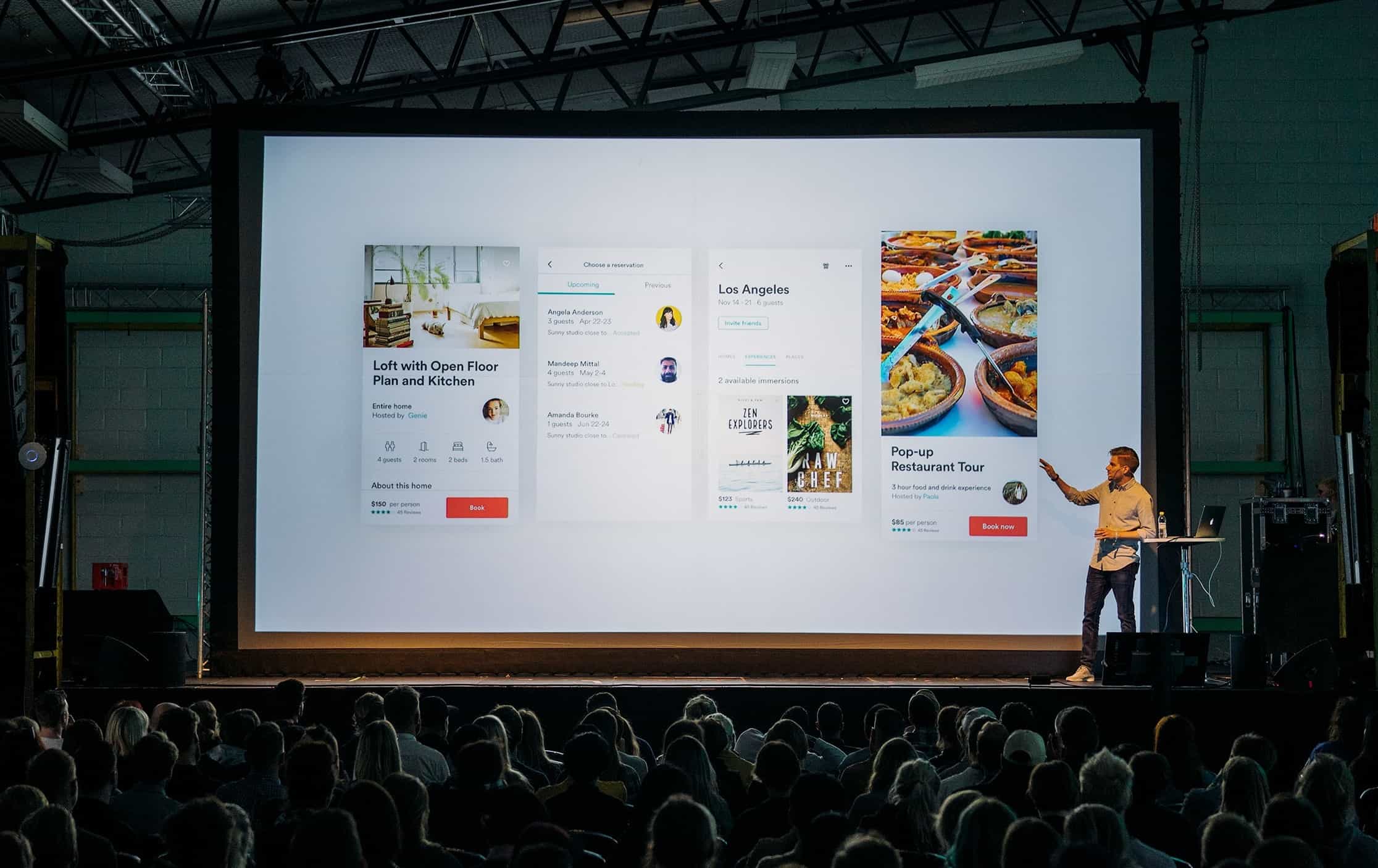 Man presenting in front of crowd